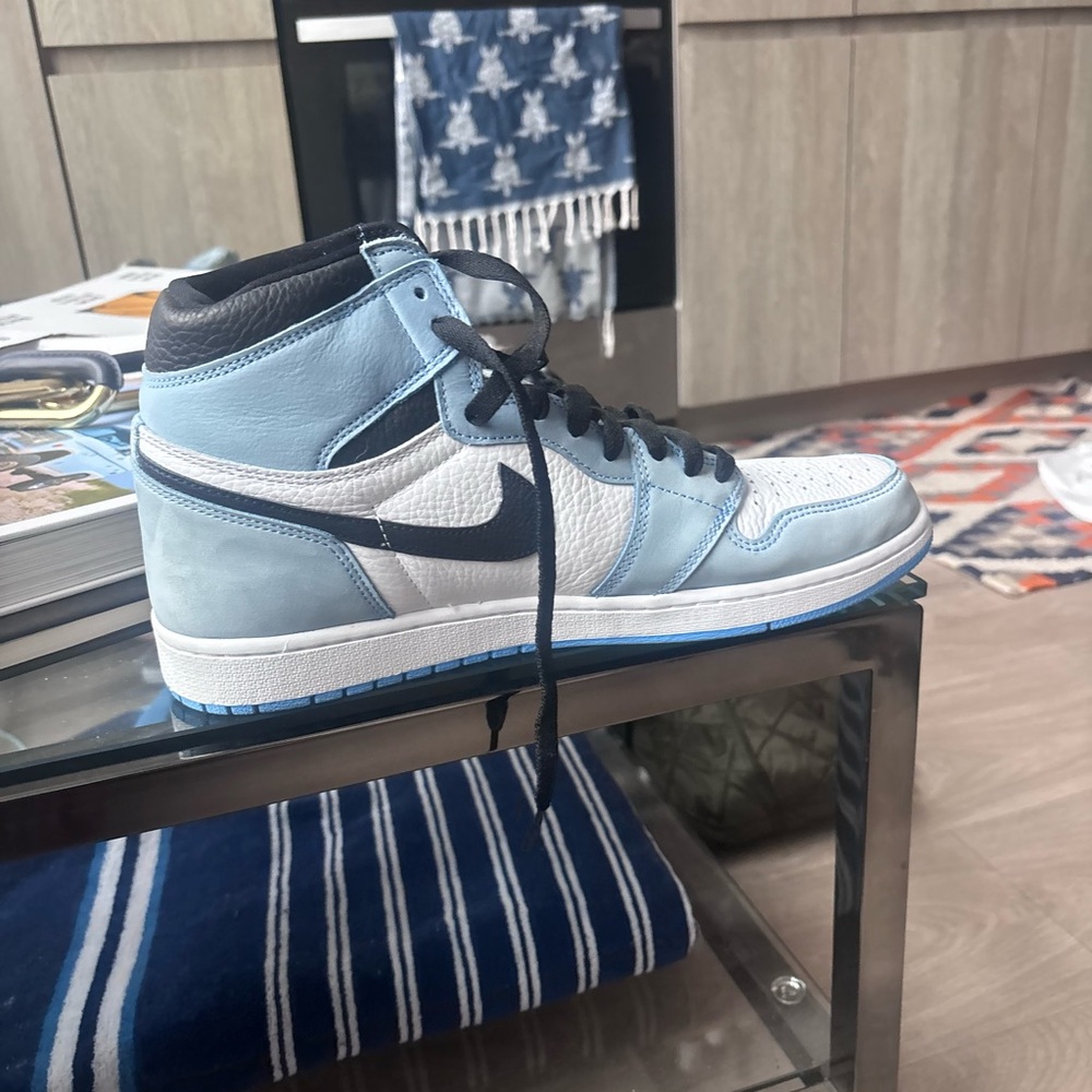 Jordan 1 Nike Men's Blue High-Top Sneakers.